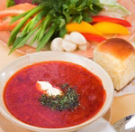 Ukrainian borsch (red-beet soup) with pampushki